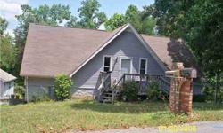 Diamond in the rough! Beautiful setting in country. Will be painted inside. Needs some trim work done. Really nice open plan, lots of beautiful brick work inside. 2-car detached gar. on almost an acre.Listing originally posted at http