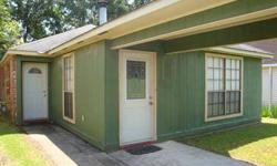 Cute 2BR/2BA garden home with front garage and large covered back porch.The living room features a recessed, beamed ceiling with beautiful woodtrim and a fireplace with a raised brick hearth. The Dining room andkitchen have ceramic tile floors and there