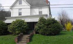 Well kept house with old time charm. 3 level lots, 2 stall garage oak mantels and woodwork. seller says hardwood floors under carpet.
Listing originally posted at http