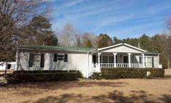 This is a nicely kept home with detached 2 car garage on +/-6.3 acres of land. There is also 2 storage buildings that cnvey with property. This property is located on Taylor Pond Rd. approx 25 minutes to Summerville. You will have plenty room for
