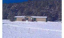 This 1,755 sq. ft. 4 bedroom, 2 bath 1996 manufactured home is located in Big Horn Ranch with views of the Wet Mountains. The home is located halfway between Canon City and Westcliffe. There are 2 storage sheds. Come enjoy the mountains and see what this