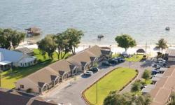 In Lakeshore Resort! Enjoy 300' of white sandy beach, Chikee hut, dock, boat slip, private boat ramp, BBQ area, etc. Totally renovated inside & out. Fabulous rental opportunity or for personal enjoyment, or BOTH! Existing rental management