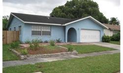 SHORT SALE. Great Carrollwood investment opportunity. Very nice 3 bed 3 bath home with lots of amenities. From a tiled foyer entry you find a open, spacious split bed plan home with so many extras. Nice ceramic tiled floors thru out. A large formal living