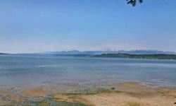 2.21 Acres With Beach Access To Hood Canal. Affordable & Private. Build Your Dream Home On This Gorgeous Wooded Acreage. Listen To The Creek That Runs Through The Middle Of The Property. Walk To The Beach. It's All Here Just Waiting For You. Seller Is