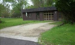 This little cabin in the heavily wooded River front community called the Richardson Subdivision Recently cleaned out and ready for someone who knows the value of 1/2 acre of land and a canvas to paint their own designs on. It is like taking a vacation 12