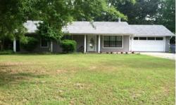 Three bedroom, 2 bath home with rock fireplace and fenced backyard. sits on 1 acre of land in the Oaklawn subdivision of East End