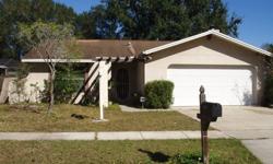 Desirable 2/2/2 Car Gar. with Fireplace and Florida room. House is in the process of repairs being made along with paint and cleaning. Seller is open to offers at any point during this process. Beacon Meadows is a great Carrollwood Community with no