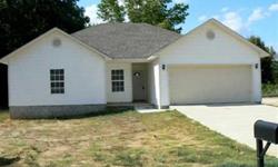 Just completed. Laminate flooring in living area and tile in kitchen--easy maintenance! Black appliances in this cute kitchen. Very nice storage area already built on the back of the house--no need for a separate stg area! Ready to move in! Seller in