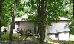 This spacious home features 2 bedrooms, 1 bath and a very large great room with gas fireplace. perfect for entertaining. Wooded 5.36 acre lot with winter mountain views. Finish the full walk-out basement to your liking.Listing originally posted at http