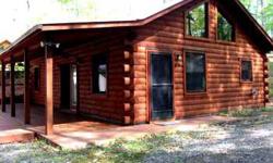 Real log 2BD/2BA log cabin with all wood interior. The home features a gas log fireplace, decorative wood fence, gravel driveway and extra large partially covered deck.Listing originally posted at http