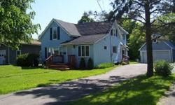 Early 1900's village home within walking distance to schools and downtown. The downstairs features an recently renovated kitchen in 2008 (all theappliances are included), living room which is open to the dining area with hard wood floors and corner gas