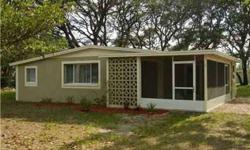 NOT A SHORT SALE, NOT BANK OWNED. BEAUTIFUL 1 ACRE FENCED LOT IN THE HEART OF VALRICO. HOUSE SITS IN THE MIDDLE SURROUNDED BY LUSH GREEN OAK TREES, TOTALLY REMODELED 3/2 BLOCK HOME, HAS BRAND NEW CERAMIC TILE AND BERBER CARPET FLOORING. NEW A/C UNIT, NEW