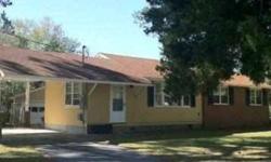Cute Home on Large Corner Lot in Well Established Neighborhood! Three Bedrooms, Two Bathrooms with One Car Carport. Interior includes Tile and Hardwood Floors, Dishwasher, Side by Side Refrigerator, and Range, Tile Counter Tops, Tile Tub Surround, and