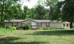 Welcome to this 3 bedroom 2 bath manufactured(Hart) home nestled on 20 wooded acres. Oversized kitchen offers spacious countertop & cabinetry space, center islland and appliances included for added value. Living room with fireplace, main floor laundry,