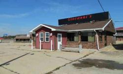Formerly ran as a restaurant, the owner's are offering this property with a complete inventory to walk-in and turn your open sign on! Boasting 1,915 sq. ft. of commercial space with a mostly open floor plan, this building has been recently updated and is