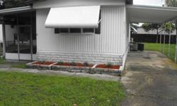 2 BR, 1.5 Bath mobile home is awesome Adult Park, Tampa, FL
screened porch, new carpet, updated stainless appliances,
covered parking, close to shopping, airport, beaches, located in a beautiful part of Tampa - Town-N-Country off Sheldon Rd. Available for