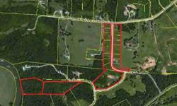 Ravens Crest Subdivision - 18 lots, paved road, city water and power at road, one 5 ac lot with frontage on Shoal Creek, some restirctions, 23.44 total acres, 15 approximately half ac lots, 3 approximately 5 ac lots. Possible owner terms.Listing