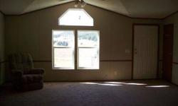 This 1,404 sq. ft. 3 bedroom, 2 bath 1996 manufactured home is located in Big Horn Ranch halfway between Canon City and Westcliffe. The property is on a county maintained road thus providing easy year-round access. There is a 1 car over-sized detached
