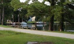 Affordable semi waterfront lot. This lot is located in New Bern across from Merchants Boat Ramp. Enjoy access to the water without the expense. Septic and electric are already in place.Listing originally posted at http