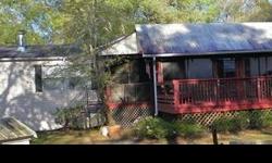 10 year new mobile home with covered porches out every door on 2 1/2 acres. Located on the Withlacoochee forest. 58,000 acres is your back yard with 34 miles of horse, bike and walking trails. Hidden Haven presently used as a dog kennel for breeding small