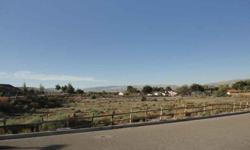 LOT IN THE RANCHES OF BLOOMINGTON, 1.19 ACRES, HORSE PRIVILEGES, four IRRIGATION WATER SHARES. THE IRRIGATION WATER IS PRESSURIZED AND PIPED TO EACH INDIVIDUAL LOT. CC&R'S AVAILABLE, CORNER LOT.Listing originally posted at http