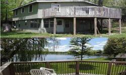 All sports Englewright lakefront 3 Bed 1.5 Bath ranch home with large attached carport, ideal as either a summer cottage or year around home, and located only 30 minutes from either Grand Rapids or Big Rapids. The walkout level provides expansion space