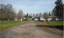 2 tax lots 12183 Golf Ln approx 1.09, 12185 Golf Ln approx .96 acre. Existing manufactured homes included. but of little value. Includes a 20x40 shop building. Existing driveway is shared between two tax lots. Buyer to perform due diligence regarding
