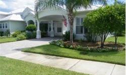 Huge.48A lot backs to lush conservation area/privacy.Charming Key West style home,metal roof,gingerbread trim,separate detached guest house w/BR,BA & mini kitchen.Porte cochere gracious entry over paved drive gives sheltered parking in addition to 2car