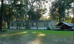 5 bedrooms, 3 baths in this immaculate 1998 Fleetwood Manufactured home. Over 2,000 square feet with split floor plan, eat-in kitchen with all appliances. 25' Great room and 16' x 16' back deck out to "pond" and picnic area. Walking distance to Williston