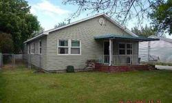 This home was built in 1948 but has had a facelift! The roof, Vinyl siding and Vinyl windows are all less than 6years old!. Very spacious bedrooms. Cute fully enclosed back yard, perfect for a small garden or flowers. Call and agent and get a look today.