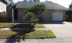 Move in ready! Very well maintained and updated! This fine home features 3 bedrooms, all with Walk-In Closets, a very comfortable 22x18 Glass enclosed Florida Room, a 50year Dimensional Shingle Roof, New Windows, Cat 5 Wired, & gorgeous Mexican Saltillo