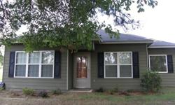 NICE 3 BR/2BA HOME W/LAMINATE FLOOR THROUGHOUT ENTIRE HOUSE.HOME HAS OPEN FLOOR PLAN SITS ON +/- 1.5 ACRE, IN A VERY QUIET SETTING, YET CLOSE TO FT BENNING BACK GATE AND COLUMBUS,GA DOWNTOWN.MASTER BATH W/GARDEN TUB SURROUND BY CERAMIC TILES ,SEPARATE