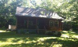Nestled among the trees is this 3 bedroom log cabin home just waiting for the right buyer to bring it back to it's former glory. Homesteps is offering a credit at closing for the actual price of a home warranty up to $500.00 for owner occupant. Freddie
