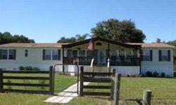SHORT SALE- NO HOA, NO RULES, Horses Welcome. Life in the country is what's in order. A double wide manufactured home in prisitine condition. Former model- lots of upgrades. Split floor plan with an easy flow. Two family room- large oversized patio,