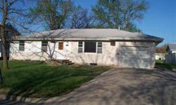 Nice neighborhood,4Bed room (1 non conforming)2 & 3/4 bath home in Herington Ks Listed by Ruth Smith Realty.The hard wood floors are refinished and look great,The eat in kitchen has been updated with new flooring,counter tops and tile.The master bed room