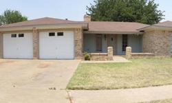 Great tile work in this house! Kitchen and Baths have custom ceramic tile. Isolated Master is large. Living area has corner fireplace. Bedrooms and Living area have laminate flooring. No carpet in this house. Great updates throughout - all rooms spacious