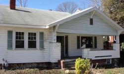 Foreclosure-3/1 Bungalow,covered front porch. 1409 sqft,gas heat.Nice sized yard,very desirable area.HDWD floors,FP,Dining Room off Kitchen.Lots of potential!Offers must include attached addenda,prequal/POF letter,EM must be certified upon acceptance.May