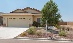 Ever so lightly lived in, 3 bedroom, 2 bath, open and bright floor plan. This home has been lovingly cared for and it shows. Many upgrades, kitchen has pull outs, large master with spacious walk in closet and the added storage in garage. Mountain views