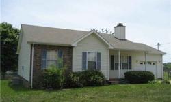 Near Ft Campbell, schools, and I-24, this house features woodburning fireplace, ceiling fans, stainless steel appliances, tiled kitchen, 3 year old roof, covered porch, large storage building, and existing home warranty.
Listing originally posted at http