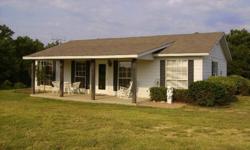 Country Serenity! Quiet country living in this charming 2 bedroom, 2 bath home built in 2003 with porch on 2 Acres. Open concept. Great Views! Home Warranty included. Call