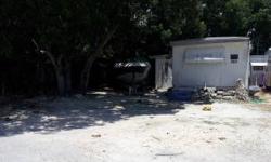 Good investment for rental, or fishermans dream. Close to John Pennecamp park and local boat ramps. This single wide mobile home is a 2/2 and is easy to maintain. The yard is gravel. There is room to park 30' plus boat.Listing originally posted at http
