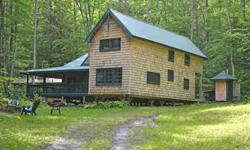 Classic Adirondack Camp built from plans for the "Bull Cottage" located on a seasonal road. Fantastic space with cathedral ceiling, 2 bedrooms with a possible 3rd bedroom on this first floor and a large wrap around deck (45 x 8) that overlooks the stream.