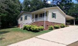 Very quite culdesac home in Woodrun on Tillery. Woodrun is a waterfront community which offers tennis courts, swimming pool, clubhouse, boat slips, boat launch and walking trails. This property has a nice open floorplan with open areas inclulding the