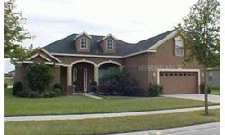 Spacious, open, well maintained home that will meet all your needs. View of enclosed pool and large pond in back. Gated community close to I-4, Lake Alfred, Auburndale and Winter Haven. Neutrral colors, large tiles, stainless appliances, lg bonus rm.