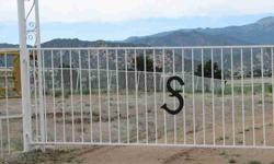 Up on the ridge overlooking the Arkansas River,mountain views to the wetand down the valley. 360 degree views perched up on top of the world.One of the prime lots in Acres of Ireland.Fully fenced and gated lot with existing well and septic. Deck built