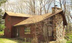 Lovingly built by the family and enjoyed by 3 generations, this spacious 4BR 2BA retreat on 2 wooded lots is set up for large gatherings, good times @ great memories! Open concept with HUGE great room, vaulted ceilings, gorgeous Wisconsin stone fireplace