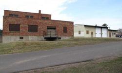 Great commercial site, next to downtown Chetek but close & easy access to Hwy 53 as well. Two separate buildings. High overhead doors, floor drains, loading dock, & office space.Listing originally posted at http