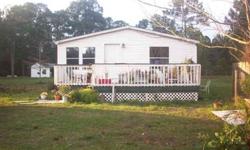 Check this one out, 3 bedroom 2 bath doublewide with family room, formal dinning room, eat in kitchen, w/ center island, master bath with garden tub, separate shower double sink vanity. A nice 9 x16 deck - great for cook outs, (5acres) 330 x 660' cleared
