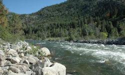 METHOW RIVER CANYON is the hottest set of new river properties in the Valley! These parcels are tucked away in a private canyon, an unheard of 1.5 to 2 miles off Highway 153 on a maintained road. LOT D offers an intimate perch above the swirling Methow