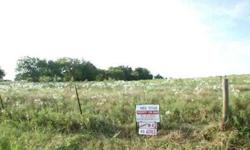 45 acres of scenic, rolling land with scattered trees - an ideal place to build that country dream home!